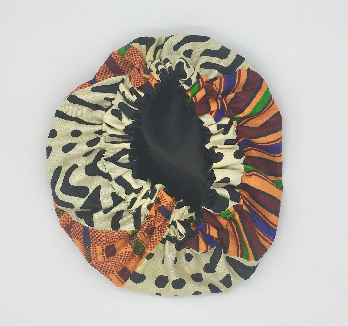 Baby Satin-Lined Bonnet: Black and White - Multicolored Strips